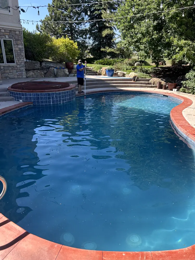 The same estate pool crystal clear after Pyle's green-to-clean recovery in Metro Denver