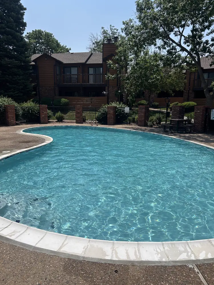 Crystal-clear HOA community pool serviced by Pyle's Pool & Spa Specialists in Metro Denver