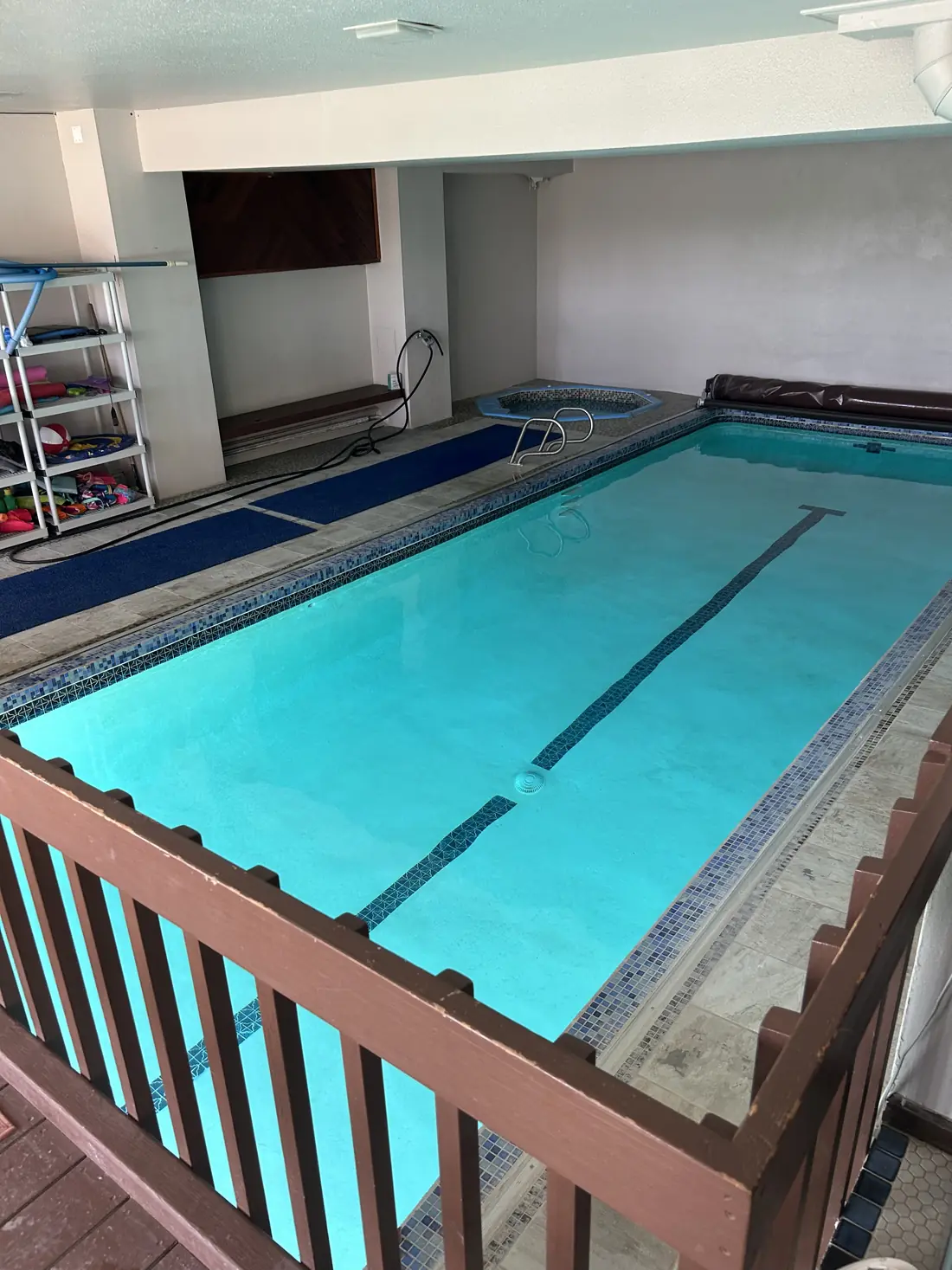 Indoor lap pool with attached spa serviced by Pyle's in Parker, CO
